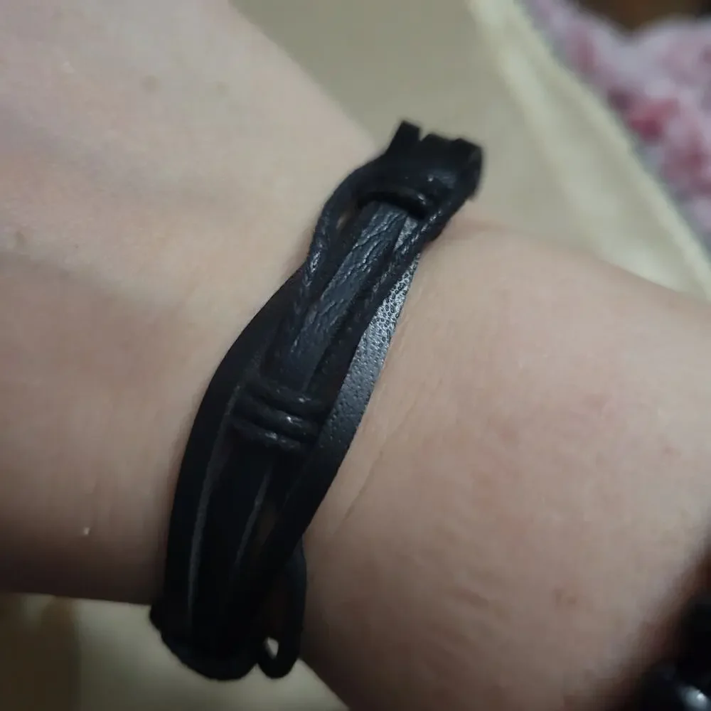 4 piece spiked black synthetic leather adjustable bracelet set